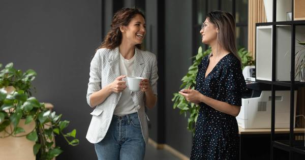 two employees having conversation in the workplace